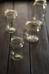 four empty jars