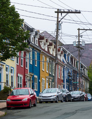 Fototapeta na wymiar Colorful homes and cars in St.John's, Newfoundland