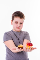 little boy with food isolated on white background - apple or a m