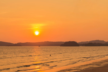 Beautiful sunset on tropical beach at andaman sea in thailand