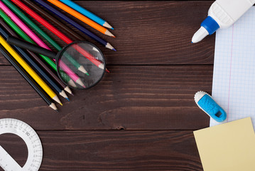 School supplies on a wooden table