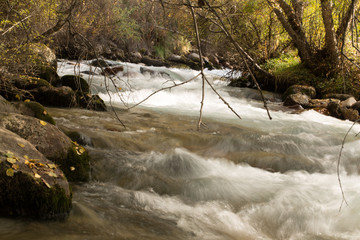 rough water in the mountain river water as a background