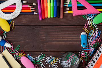 Fototapeta premium School supplies on a wooden table