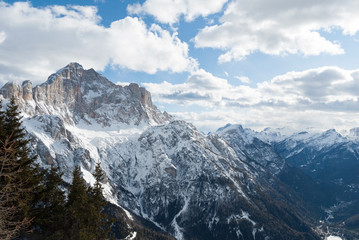 Dolomiti, Italy mountain valley view, forest, lake and winter snow ski