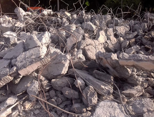 Stones, destroyed buildings, building. Demolition. A pile of sto