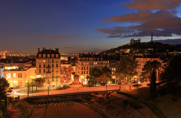Amphitheatre des Troi Gaules and Basilica Notre-Dame de Fourviere in the evening. Lyon, France