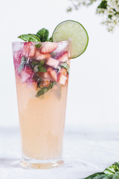 Honey Sweetened Limeade with Strawberries and Basil