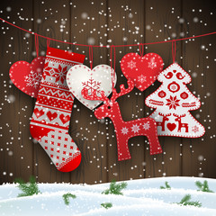 Christmas folklore decorations hanging in front of brown wooden wall, illustration
