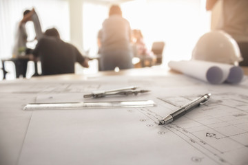 Desk of Engineering project in construction site or office with mining light.Construction...