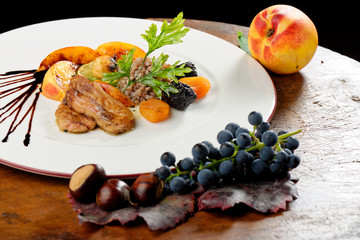 Fine dining, roasted Foie gras with brown rice and dry fruit