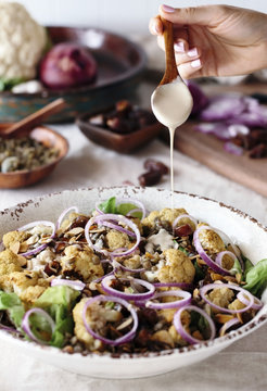 Roasted Cauliflower Salad with Lentils, Dates, Onions, and Tahin