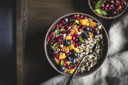 Coconut Quinoa Porridge with Berries and Quinoa Crunch Topping