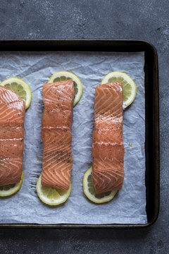 Raw fresh salmon on baking tray