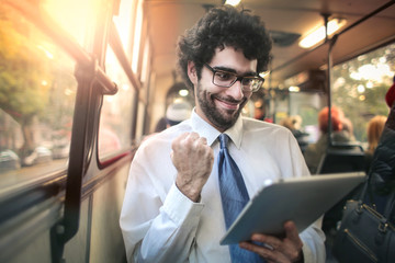Obraz premium Successful businessman on a tram