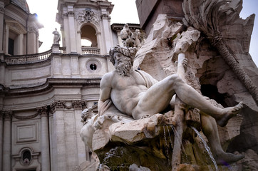 architectural detail Zeus statue of fountain in Piazza Navona Ro