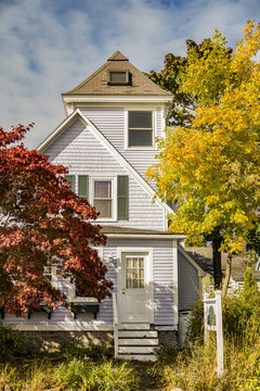 New England traditional house in the fall