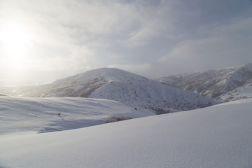 dawn sun in the snowy mountains