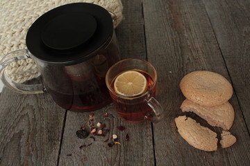comfort and tea with lemon and biscuits. winter and autumn are pleasantly warm tea.