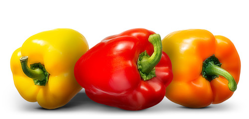 Group of multi colored bell peppers isolated on white background.
