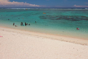Fototapeta na wymiar Sandy beach and ocean. Lagoon Hermitage, Reunion