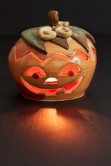 Pumpkin lantern for Halloween. Haunted greeting. 

