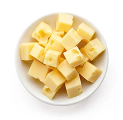 Fotobehang Bowl of diced cheese squares from above © bigacis