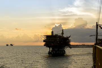 Silhouette of oil rig or platform at oilfield in Malaysia

