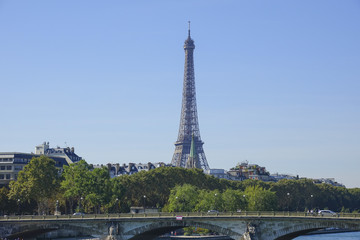 Fototapeta na wymiar The Eiffel Tower in Paris - view from Alexandre III Bridge