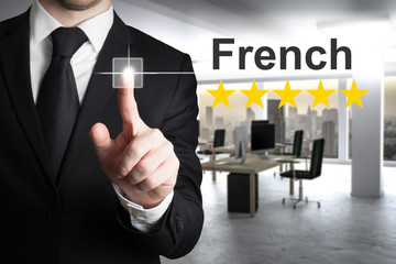businessman writing french in the air