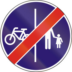 Road sign used in Hungary - End of separate lanes for pedestrians and Cyclists