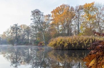 Early morning lake view with autumn colours