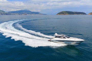 luxury motor boat, rio yachts italian shipyard, aerial view © Andrea