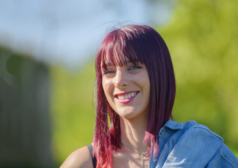 beautiful young woman with red hair, outdoors