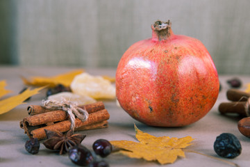 Red garnet fruit close up on table. Selective focus