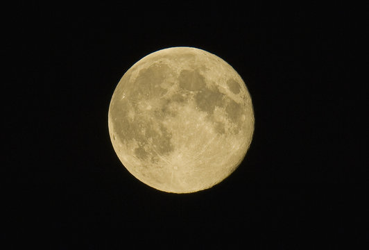 Details on the surface of a full moon in a dark sky;Anchorage alaska united states of america