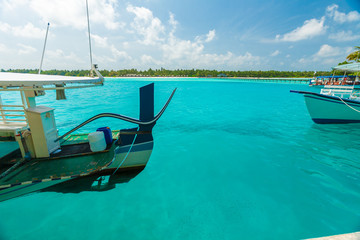 Traditional boats and the pier beside island, Maldives