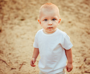 Cute little man on the beach