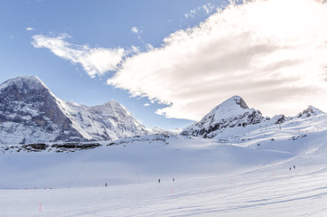 Fototapeta na wymiar Swiss landscape of alps and white snow blurred