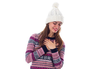 Woman in sweater and white hat