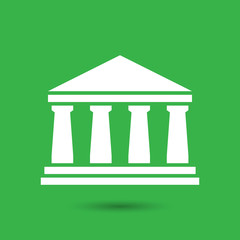 white bank icon on a green background