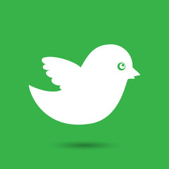 white bird icon on a green background