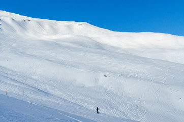 Fototapeta na wymiar Descent. Ski resort. Swiss Alps