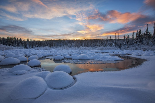 Red clouds at sunset over mcintyre creek;Whitehorse, yukon, canada