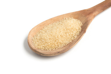 Demerara Sugar into a spoon