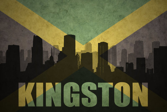 abstract silhouette of the city with text Kingston at the vintage jamaican flag