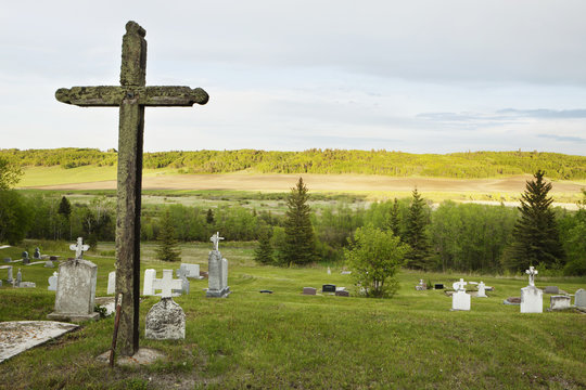Old graveyard with large cross;Manitoba canada