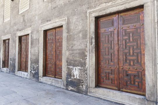 Four double doorways in a row along a wall at the blue mosque;Istanbul turkey