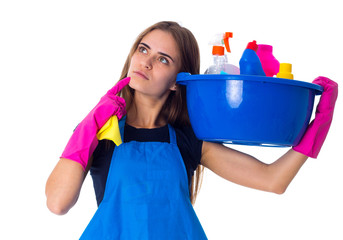Woman holding cleaning things in washbowl