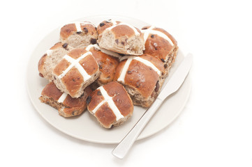 Easter Hot Cross Buns on Plate with Knife
