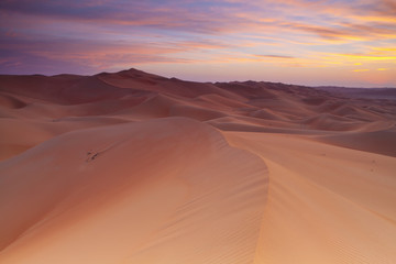 Sunset Over The Sand Dunes; Liwa Oasis, Abu Dhabi, United Arab Emirates